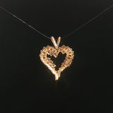 14k Yellow Gold and 0.60cttw Round and Baguette Diamond Heart Pendant