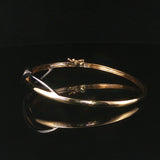 14k Yellow and White Gold 0.50cttw Diamond Fancy Bangle Bracelet 6.75"