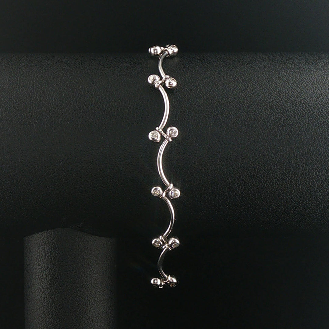 14k White Gold and 0.30cttw Bezel Set Diamond Curved Bar Link Bracelet 7"