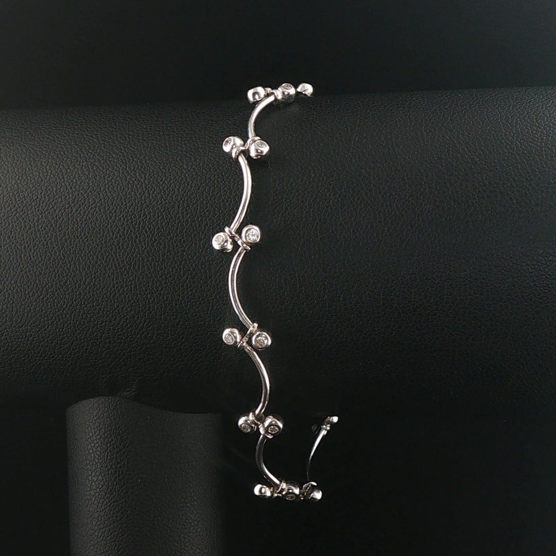 14k White Gold and 0.30cttw Bezel Set Diamond Curved Bar Link Bracelet 7"