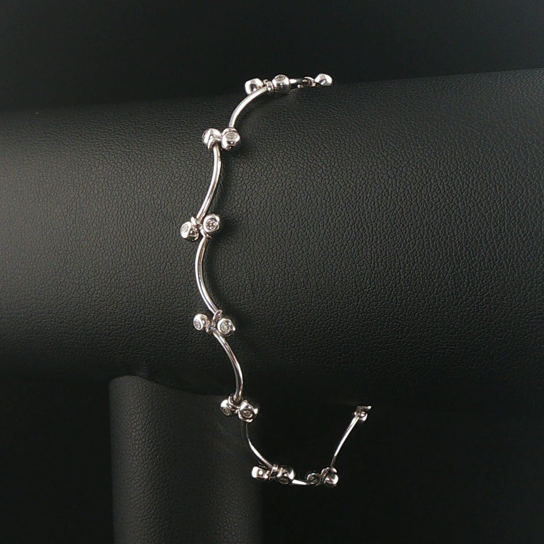 14k White Gold and 0.30cttw Bezel Set Diamond Curved Bar Link Bracelet 7"