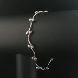 14k White Gold and 0.30cttw Bezel Set Diamond Curved Bar Link Bracelet 7"