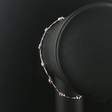 14k White Gold and 0.30cttw Bezel Set Diamond Curved Bar Link Bracelet 7"