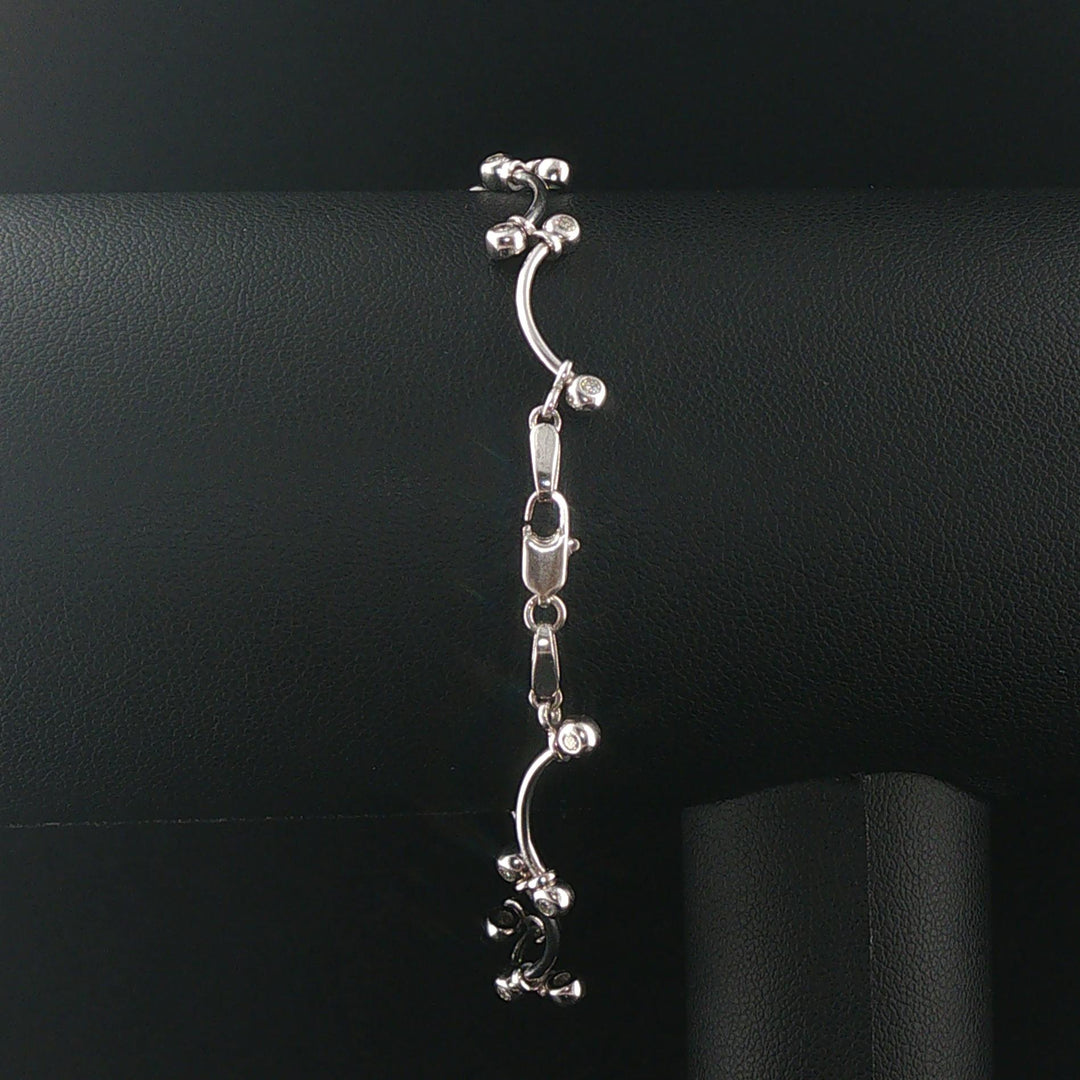 14k White Gold and 0.30cttw Bezel Set Diamond Curved Bar Link Bracelet 7"