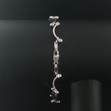 14k White Gold and 0.30cttw Bezel Set Diamond Curved Bar Link Bracelet 7"