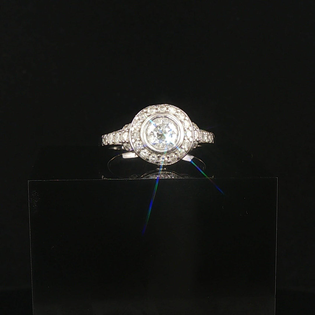 14k White Gold and 0.70cttw Diamond Vintage Halo Ring Size 7.75