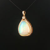 14k Yellow Gold 11.35ct Pear Opal and Diamond Halo Pendant 1.4"