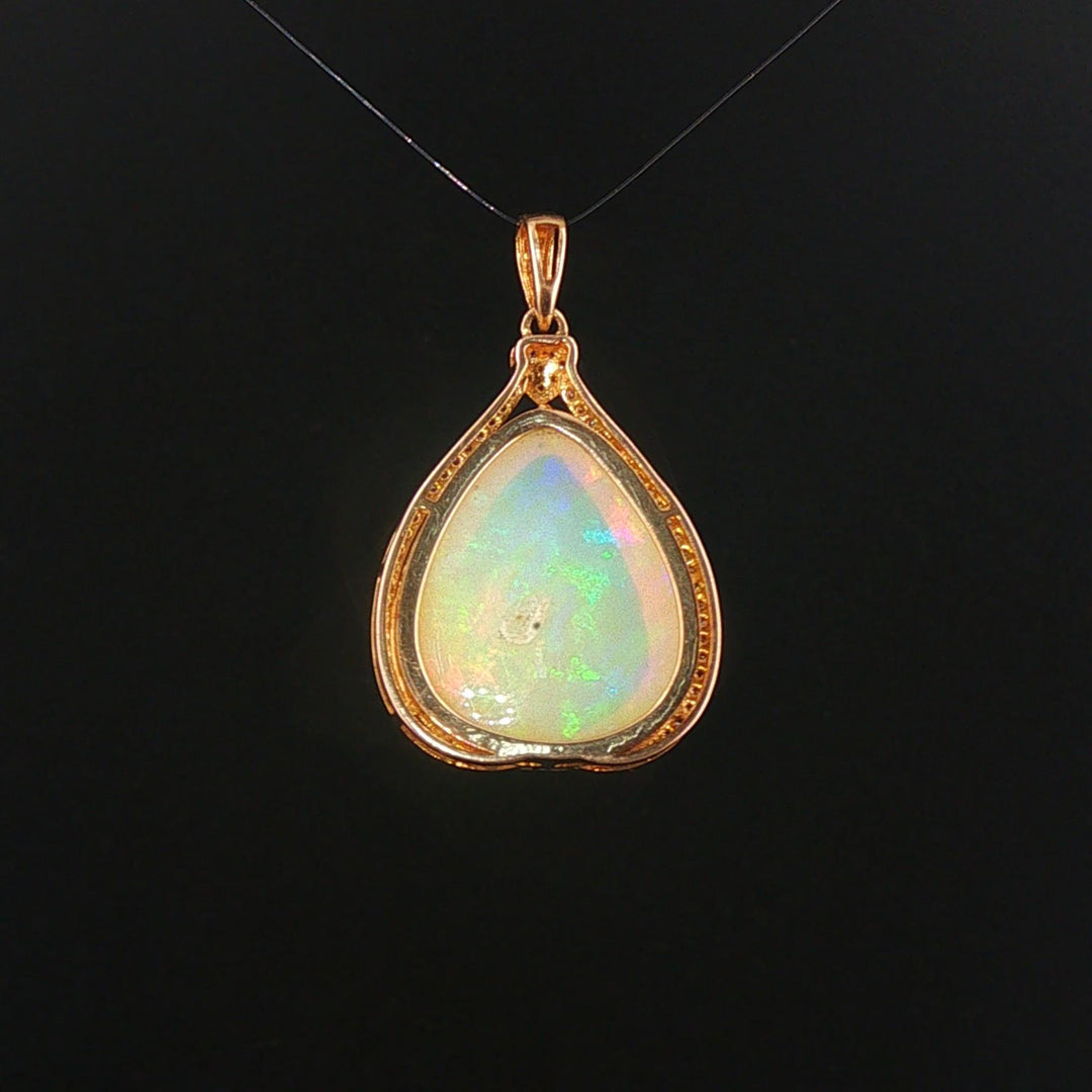 14k Yellow Gold 11.35ct Pear Opal and Diamond Halo Pendant 1.4"