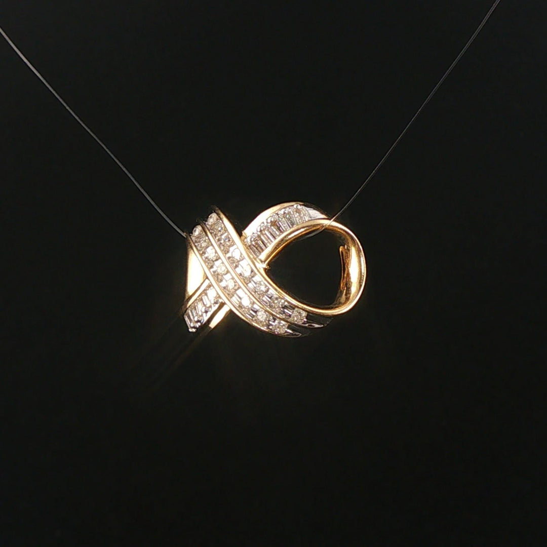 14k Yellow Gold and 0.25ct Round and Baguette Diamond Slide Pendant