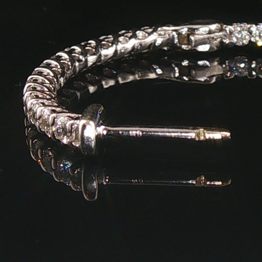 14k White Gold and 1.50cttw Diamond Inside Out Oval Hoop Earrings 1.25"