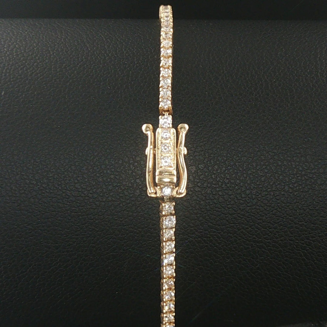 14k Yellow Gold and 1.25cttw Diamond Thin Ladies Tennis Bracelet 7.25"