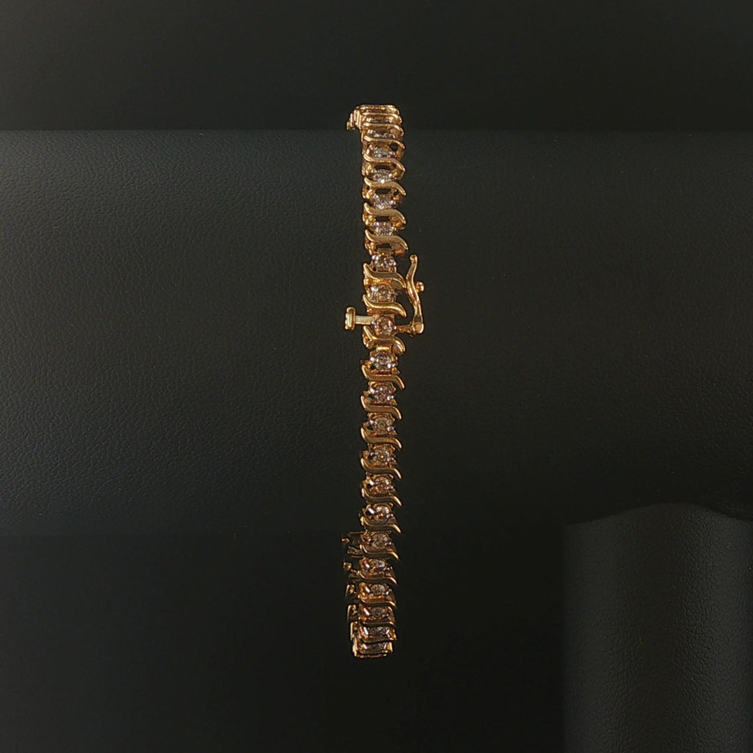 10k Yellow Gold and 2.5cttw Diamond Vintage S Link Tennis Bracelet 7.25"