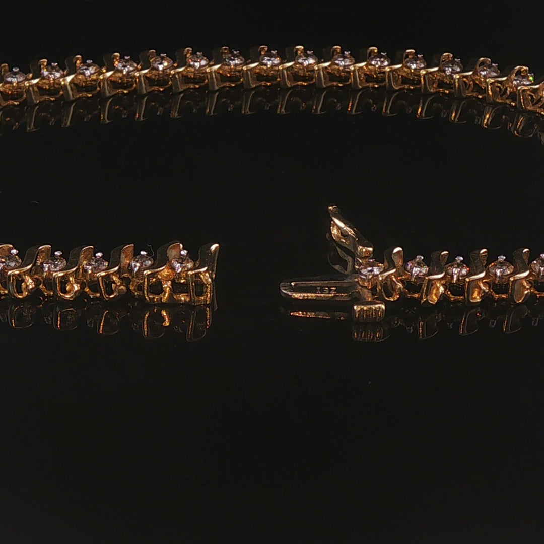 10k Yellow Gold and 2.5cttw Diamond Vintage S Link Tennis Bracelet 7.25"