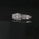 14k White Gold and 0.75cttw Three Diamond Halo Ring Size 7