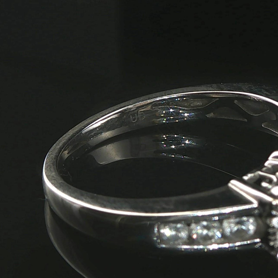 14k White Gold and 0.75cttw Three Diamond Halo Ring Size 7