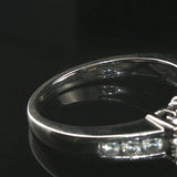 14k White Gold and 0.75cttw Three Diamond Halo Ring Size 7