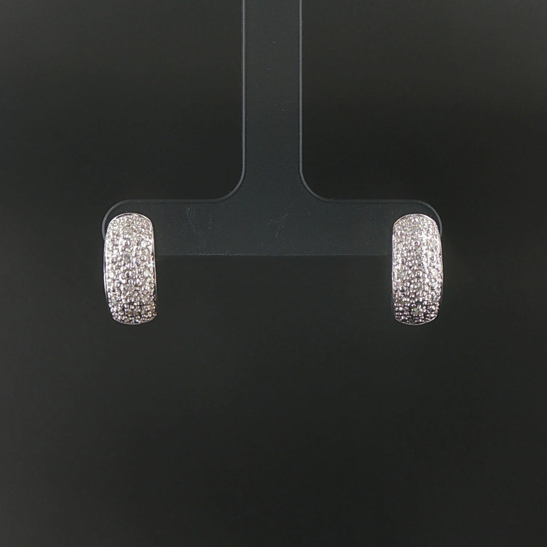 14k White Gold and 0.20cttw Diamond Huggie Earrings