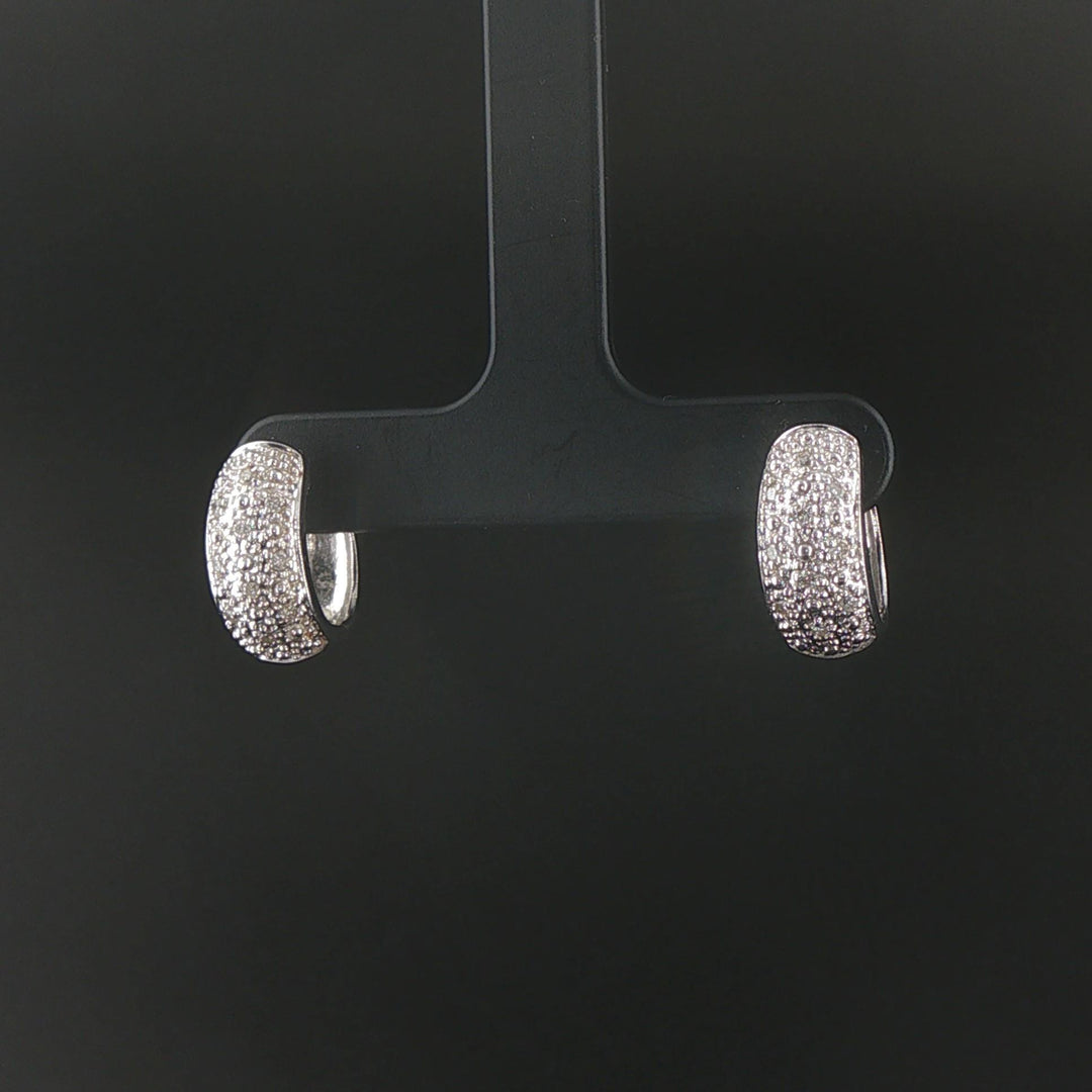 14k White Gold and 0.20cttw Diamond Huggie Earrings