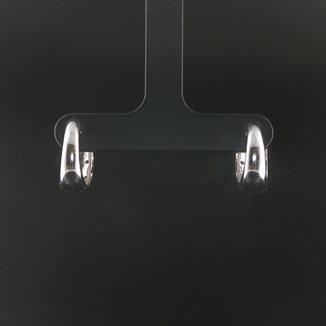 14k White Gold and 0.20cttw Diamond Huggie Earrings