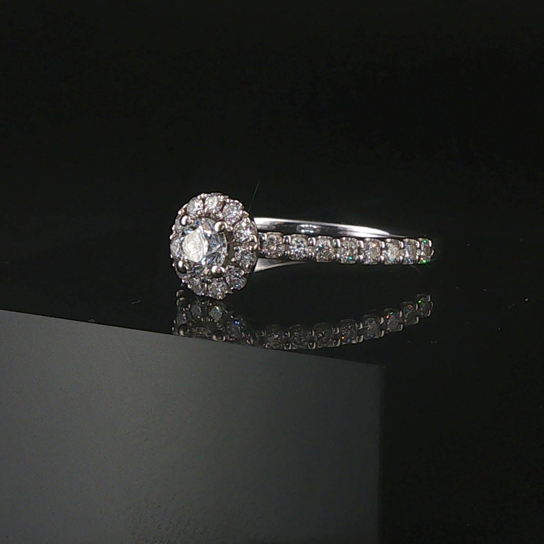 14k White Gold and 0.50cttw Diamond Halo Ring Size 7