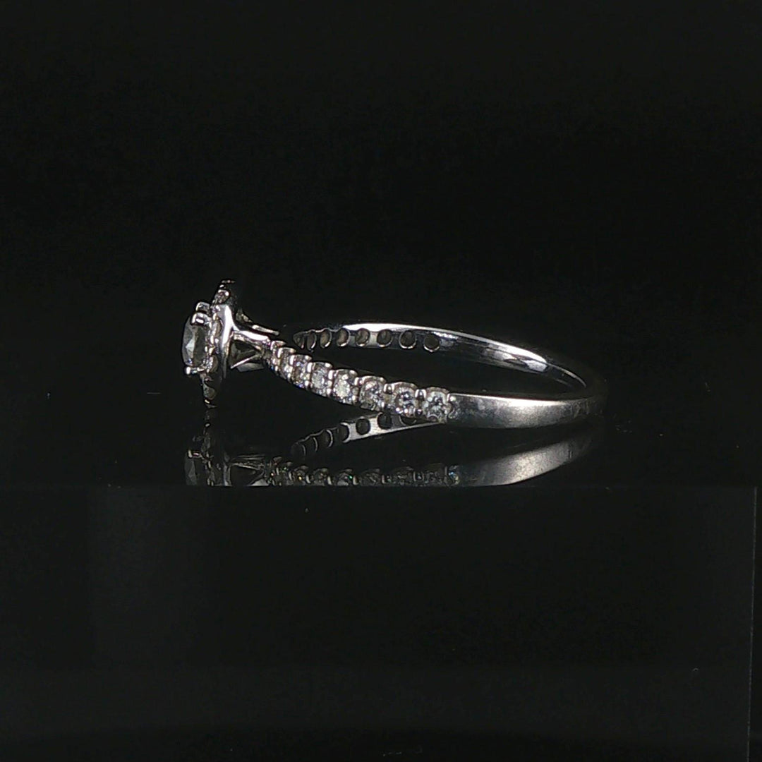 14k White Gold and 0.50cttw Diamond Halo Ring Size 7