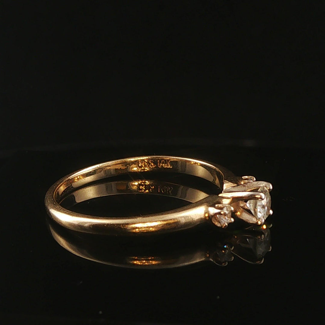 14k Yellow Gold and 0.31cttw Three Diamond Ring Size 7.5