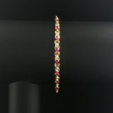 14k Yellow Gold Marquise Cut Rubies and Diamond X Link Bracelet 6.75"