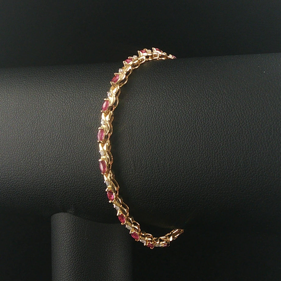 14k Yellow Gold Marquise Cut Rubies and Diamond X Link Bracelet 6.75"