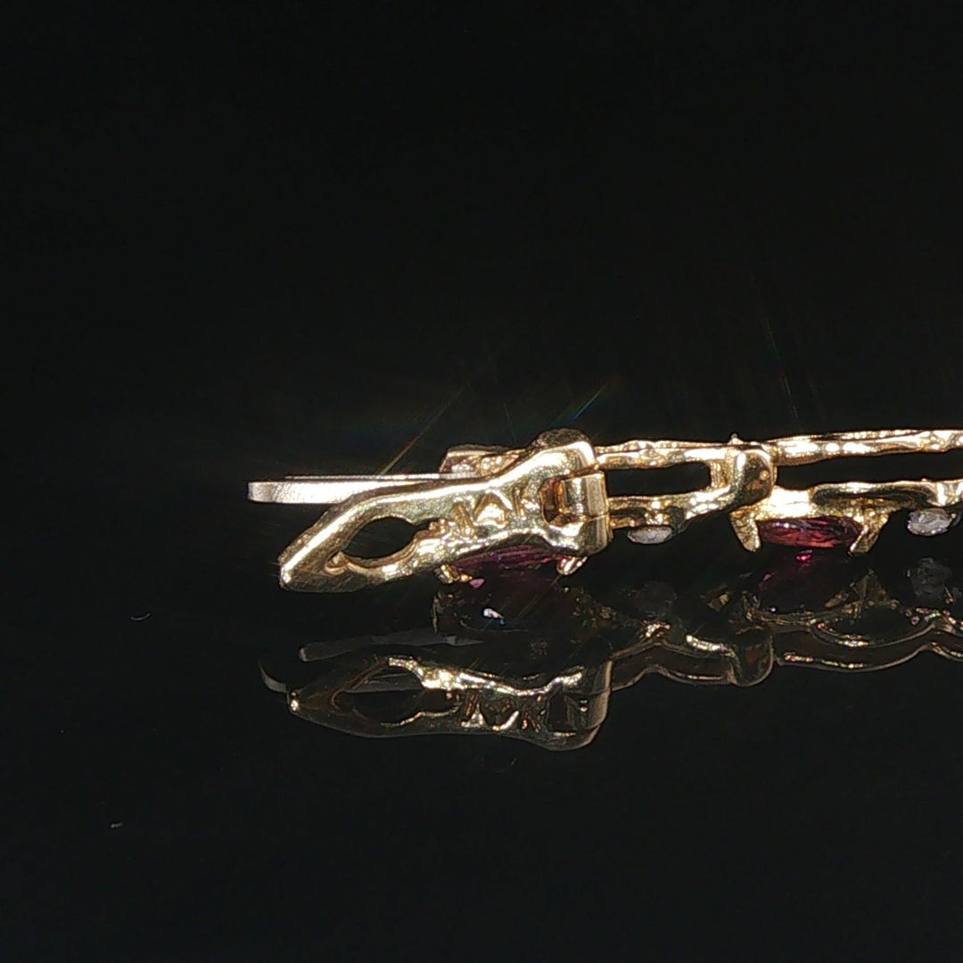 14k Yellow Gold Marquise Cut Rubies and Diamond X Link Bracelet 6.75"