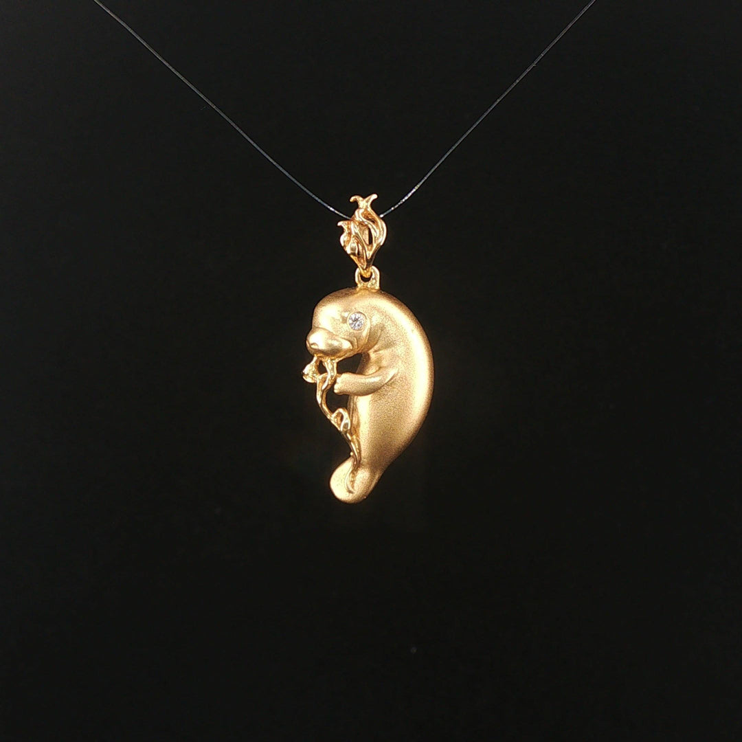 Steven Douglas 14k Yellow Gold Diamond Eye Manatee Pendant