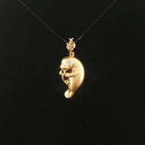 Steven Douglas 14k Yellow Gold Diamond Eye Manatee Pendant