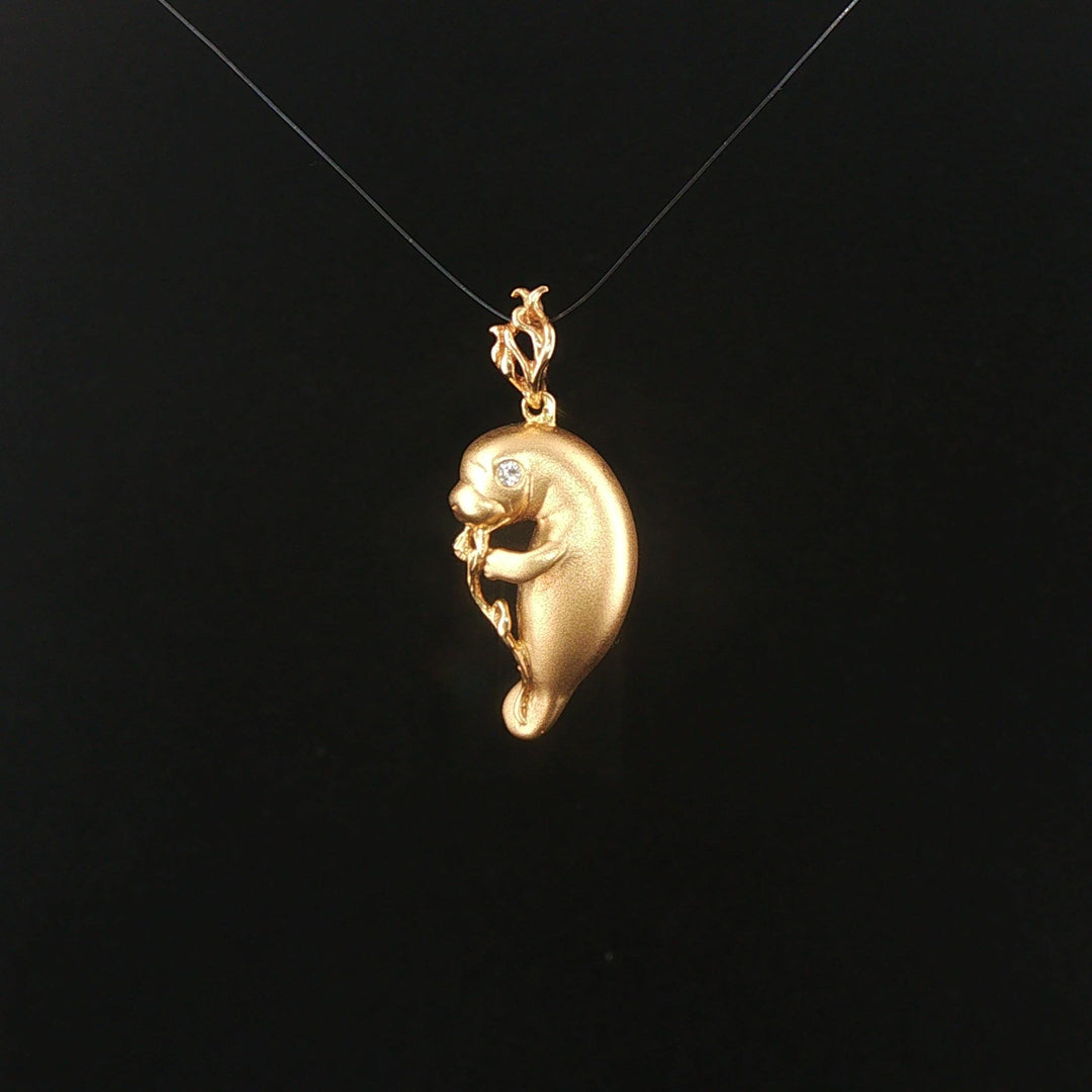 Steven Douglas 14k Yellow Gold Diamond Eye Manatee Pendant