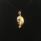 Steven Douglas 14k Yellow Gold Diamond Eye Manatee Pendant