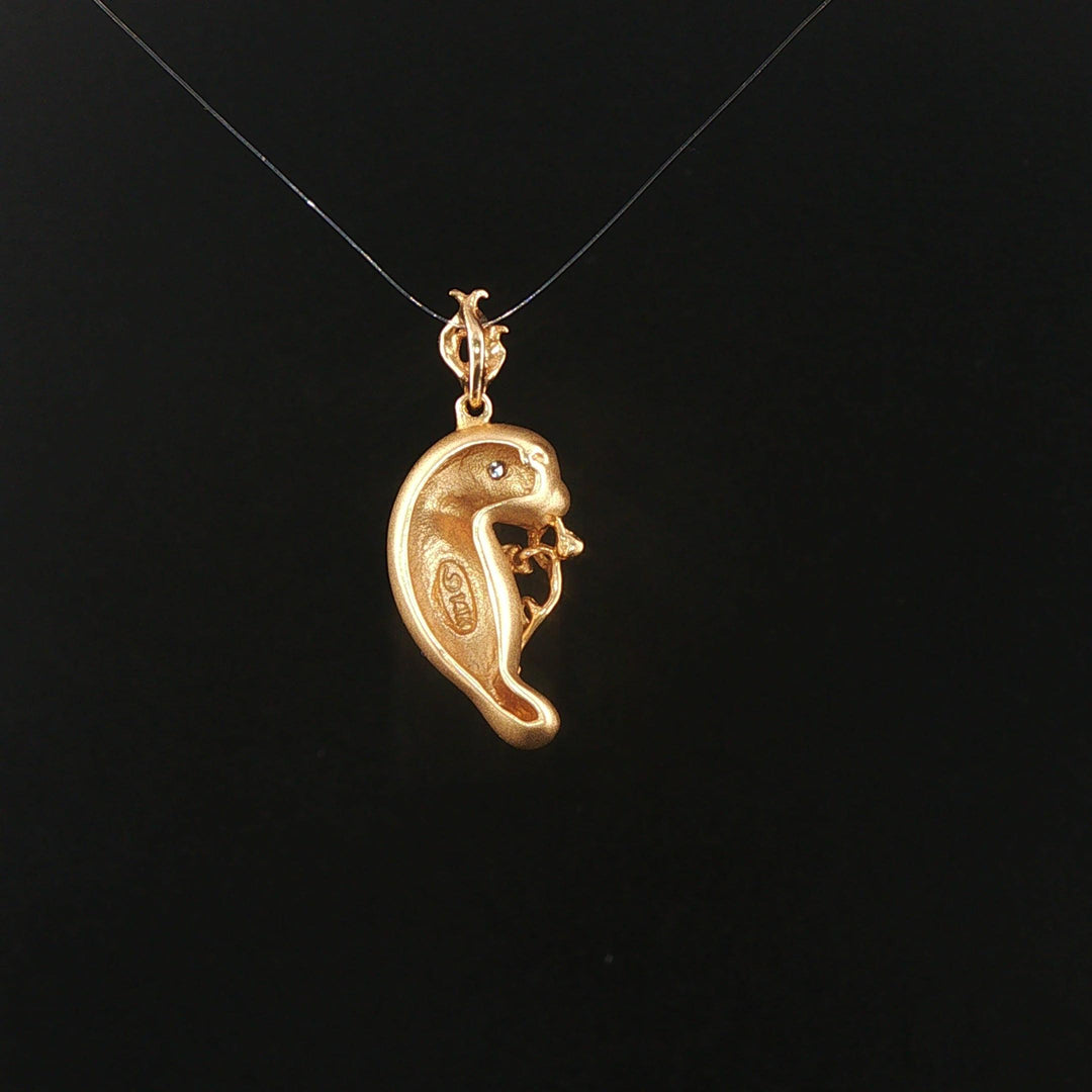 Steven Douglas 14k Yellow Gold Diamond Eye Manatee Pendant