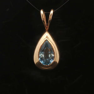 14k Yellow Gold and Pear Cut Blue Topaz 5.2g Pendant 1.2"