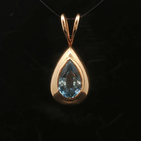 14k Yellow Gold and Pear Cut Blue Topaz 5.2g Pendant 1.2