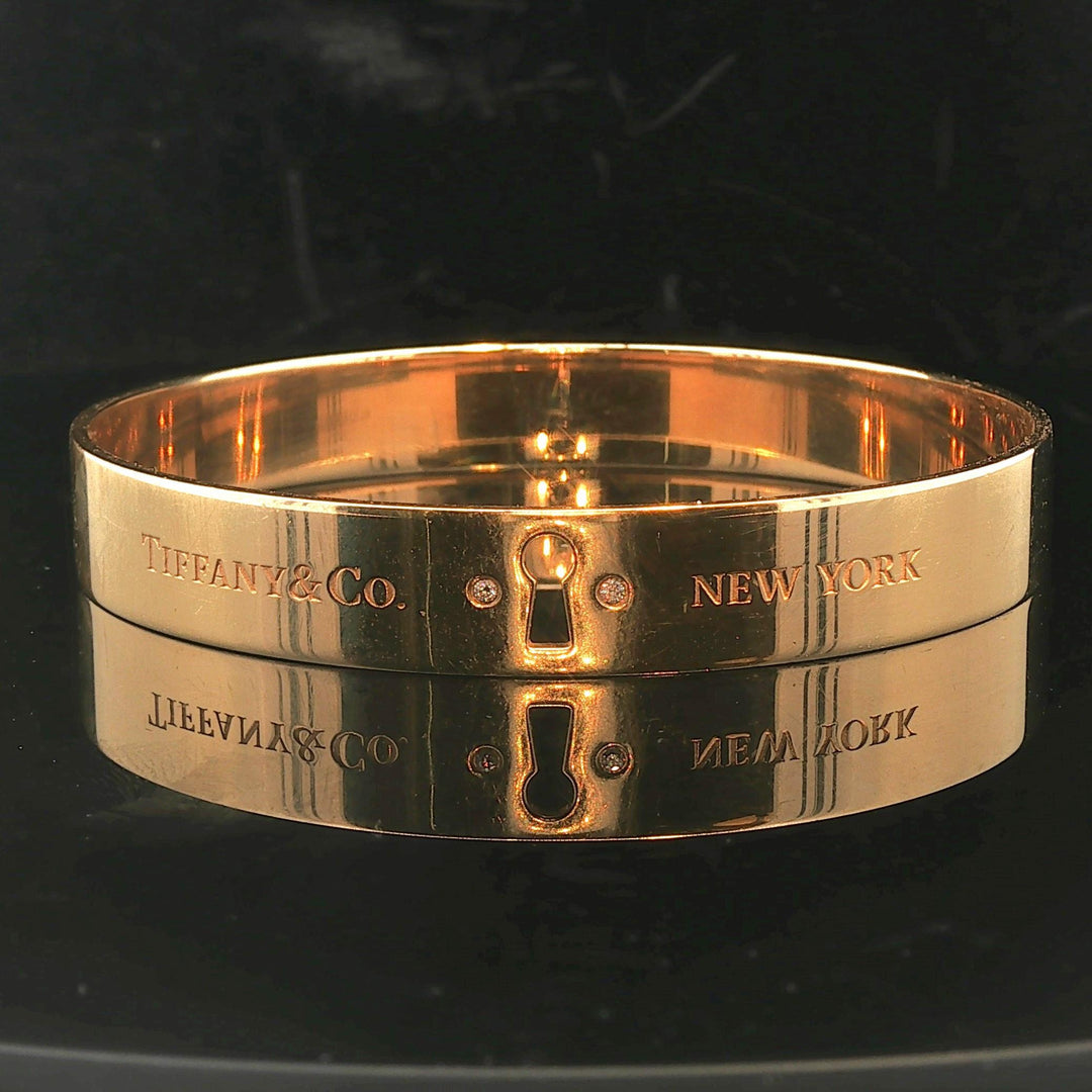 Tiffany & Co. 18k Yellow Gold and Diamond Solid Keyhole Bangle Bracelet 7.75"
