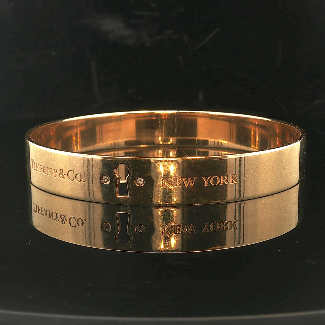Tiffany & Co. 18k Yellow Gold and Diamond Solid Keyhole Bangle Bracelet 7.75"
