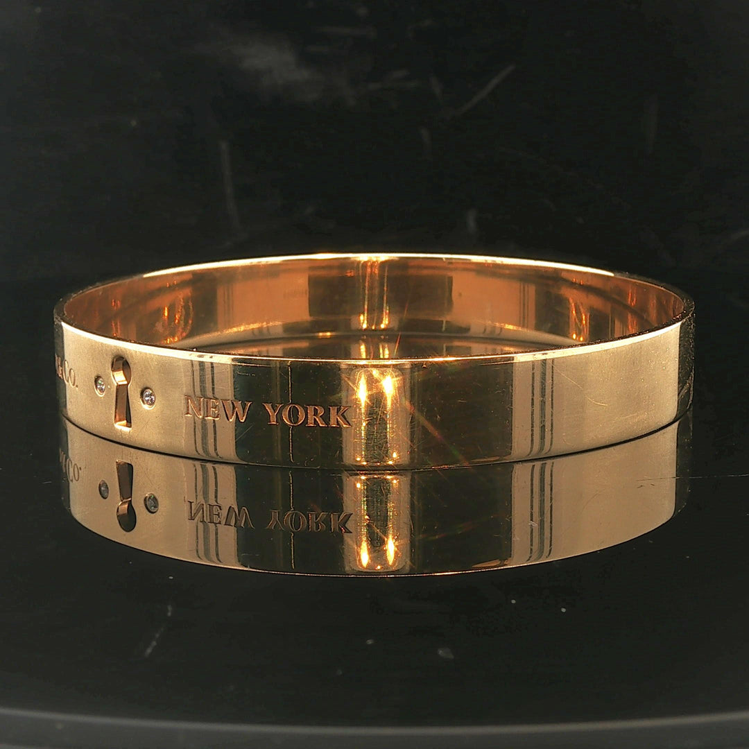 Tiffany & Co. 18k Yellow Gold and Diamond Solid Keyhole Bangle Bracelet 7.75"