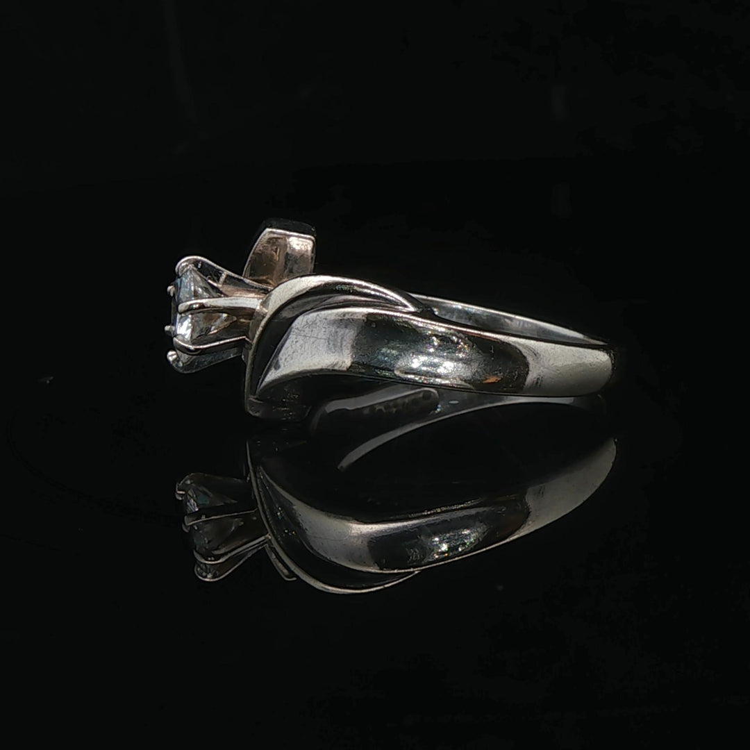 14k White Gold and 0.60ct Solitaire Diamond Bypass Ring Size 7