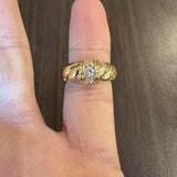 18k Yellow Gold and 0.36cttw Three Diamond Twist Band Ring Size 6