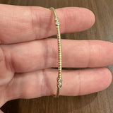 14k Yellow Gold and 0.25cttw Bezel Set Diamond Ribbed Bangle Bracelet 7.75"