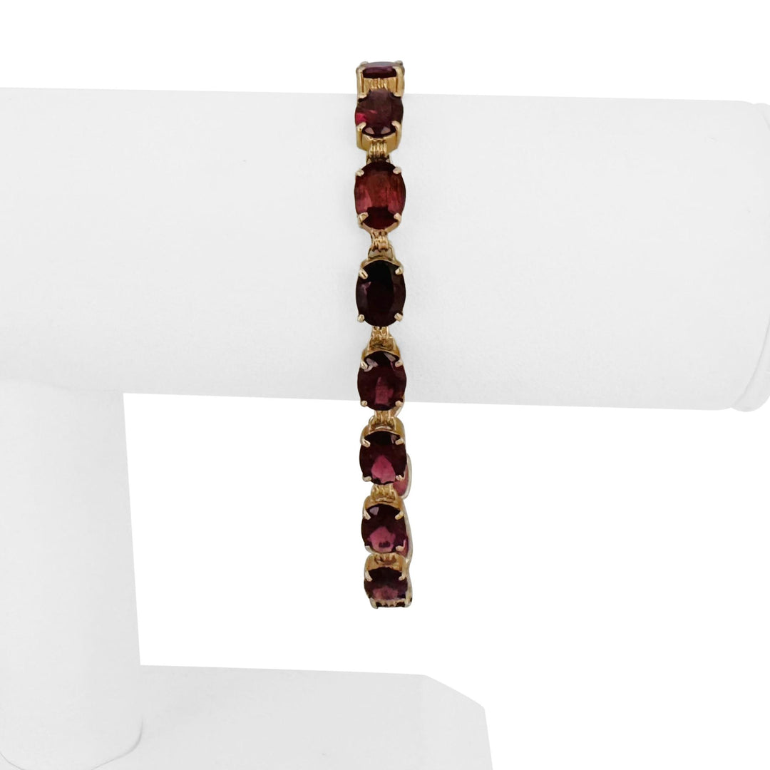 14k Yellow Gold 10.7g Oval Cut Garnet Ladies Link Bracelet 7.25"