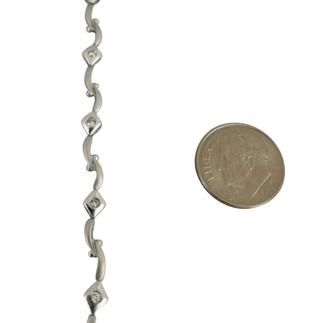 14k White Gold and 0.25cttw Flush Set Diamond Link Bracelet 6.75"