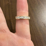14k Yellow Gold and 0.70cttw Round and Baguette Cut Diamond Band Ring Size 6.5