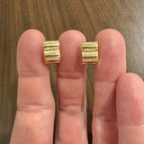 18k Yellow and White Gold 0.20cttw Diamond Solid Huggie Earrings