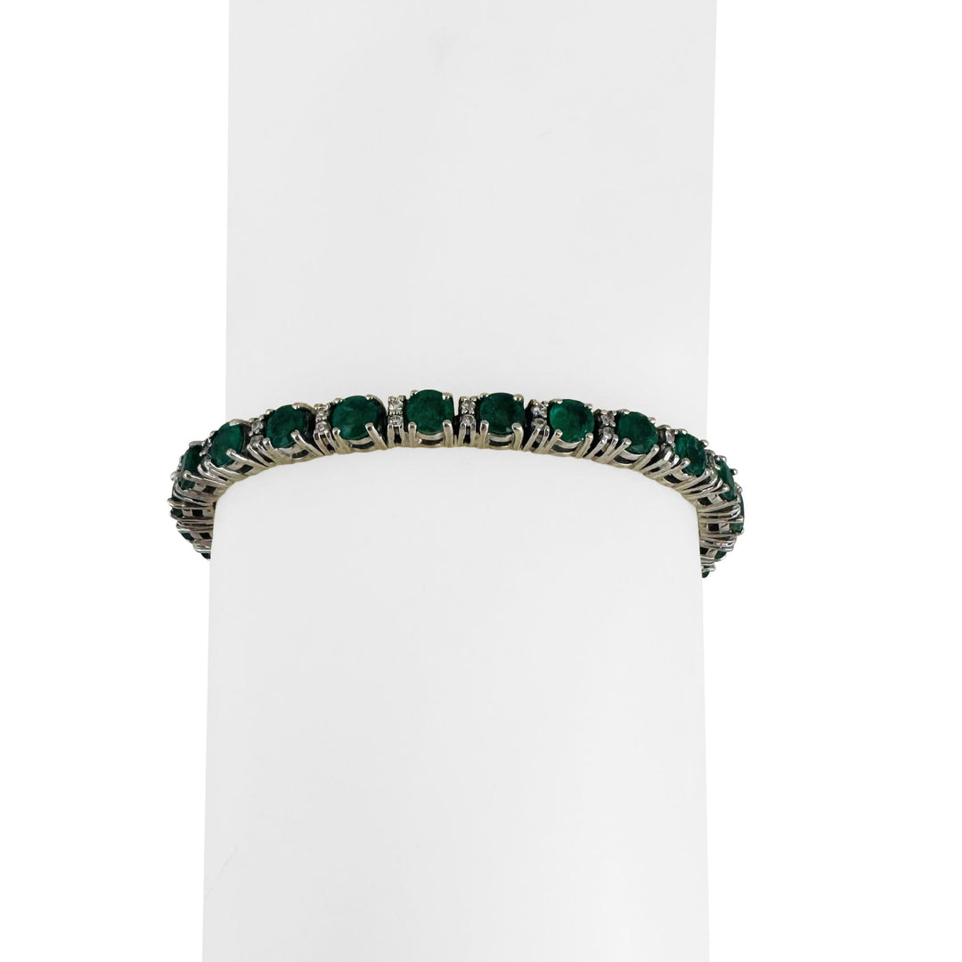 14k White Gold 4cttw Emerald and 0.50cttw Diamond 17.7g Tennis Bracelet 7"