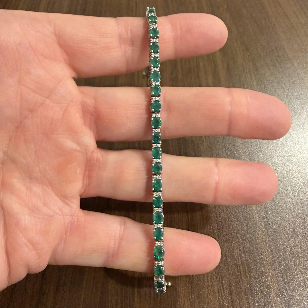 14k White Gold 4cttw Emerald and 0.50cttw Diamond 17.7g Tennis Bracelet 7"