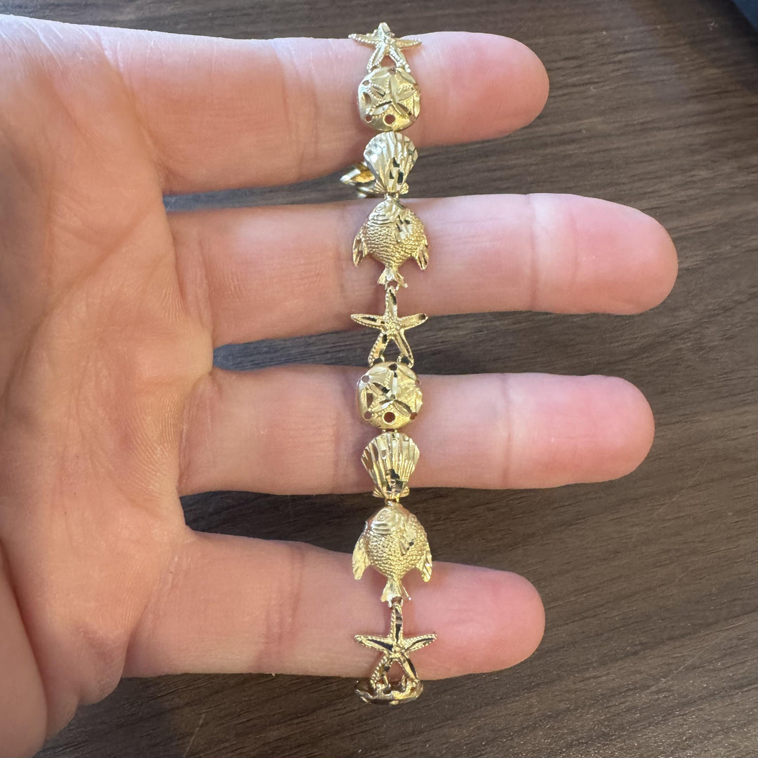 14k Yellow Gold 12.8g Diamond Cut Beach Ocean Charm Link Bracelet 7.25"