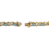 14k Yellow Gold and Blue Topaz 9.7g Ladies X Link Bracelet 7.25 Inches